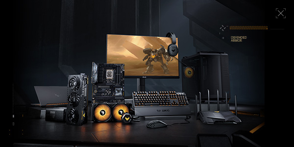 A set of TUF Gaming products, including a motherboard, graphics card, peripherals and monitor.